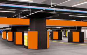 AKIBA WARP｜JR秋葉原駅の電気街口改札と中央改札を結ぶコンコース上に設置されたデジタルサイネージとシート広告