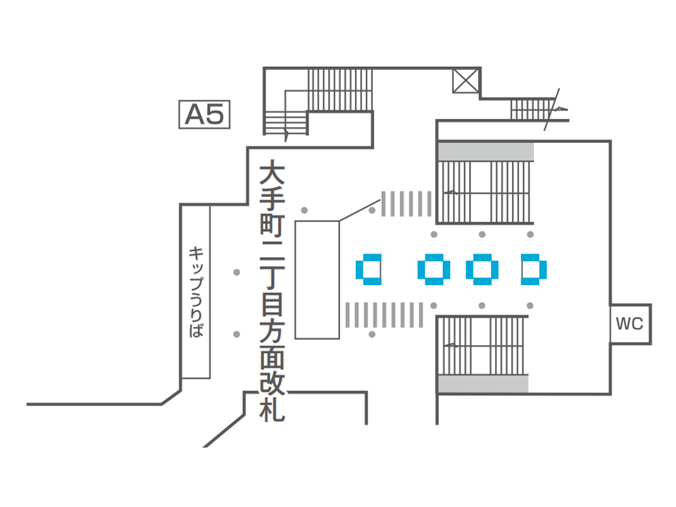 大手町駅のどこにデジタルサイネージが設置されているか説明している画像です。丸ノ内線方面改札のそば